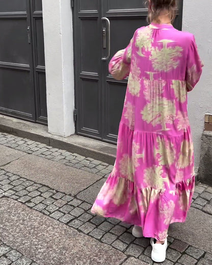 Nelina™ | Losse bedrukte jurk met v-hals en klokmouwen