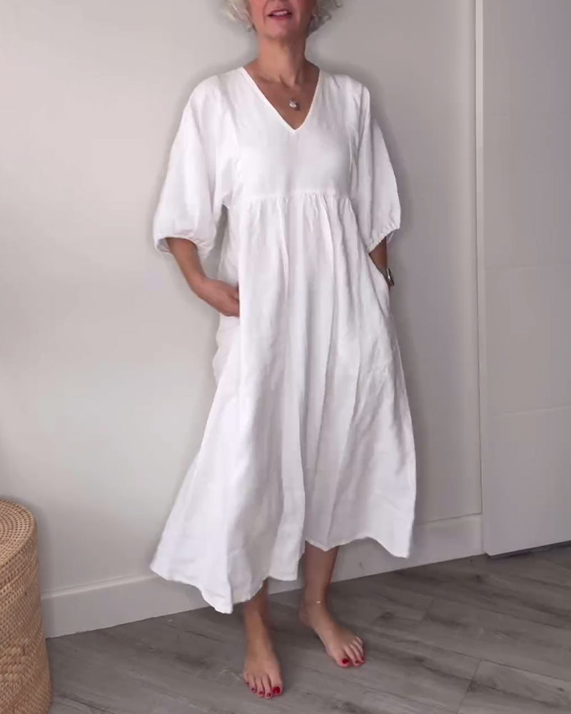 Minka™ | Minimalistische witte jurk met V-hals en korte mouwen