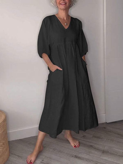 Minka™ | Minimalistische witte jurk met V-hals en korte mouwen
