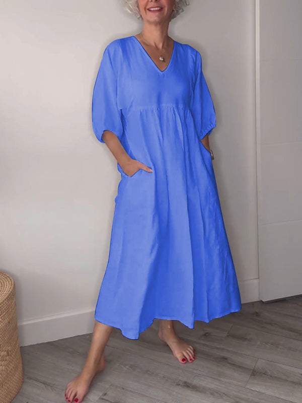 Minka™ | Minimalistische witte jurk met V-hals en korte mouwen